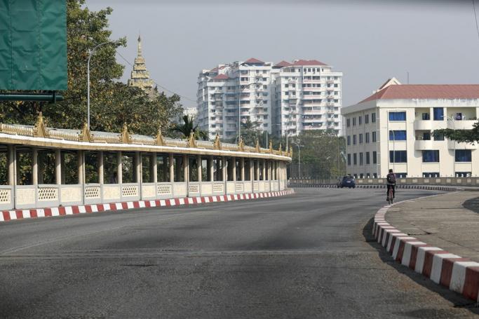 A car drives on an empty road in downtown Yangon, Myanmar, 01 February 2023. Photo: EPA