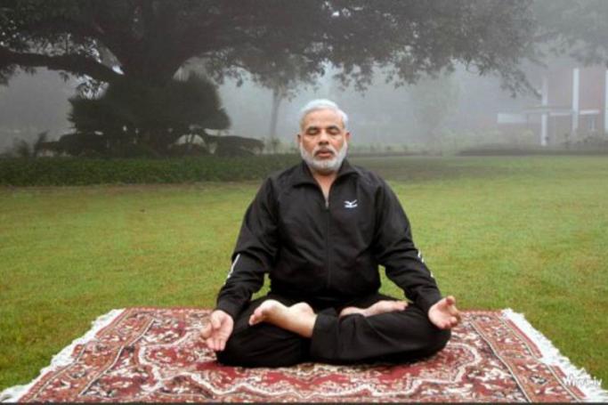 Indian PM Narendra Modi practicing what he preaches - Yoga.
