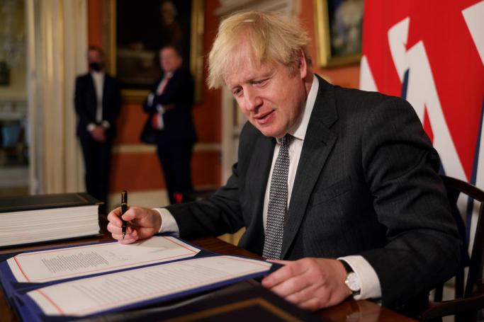 Britain's Prime Minister Boris Johnson after signing the Trade and Cooperation Agreement between the UK and the EU, the Brexit trade deal, at 10 Downing Street London, Britain, 30 December 2020. Photo: ANDREW PARSONS / DOWNING STREET HANDOUT/EPA