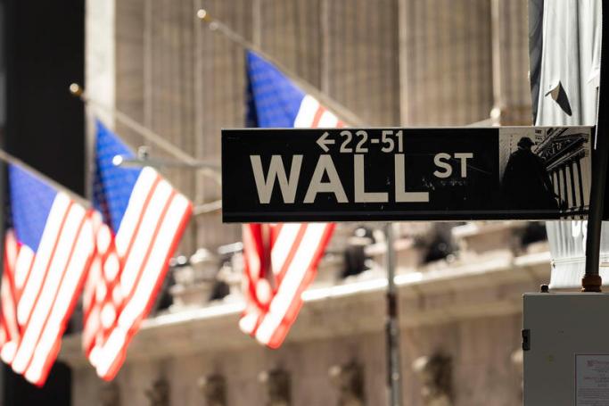 A sign for Wall Street in front of the New York Stock Exchange in New York, New York, USA. Photo: EPA