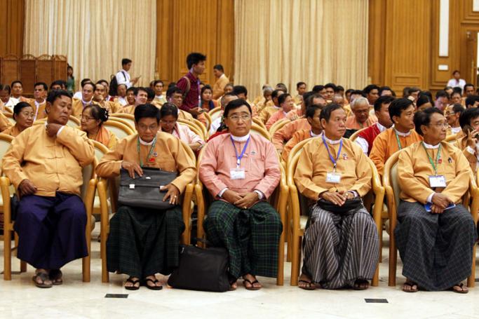 Parliament members of National League for Democracy (NLD) party attend a meeting with Myanmar democracy leader Aung San Suu Kyi in the Parliament, ZabuThiri Hall, Naypyitaw, Myanmar, 01 March 2016. Photo: Hein Htet/EPA
