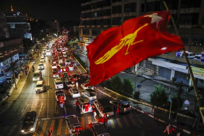 (File) Vehicles with supporters of National League for Democracy (NLD) party, led by Myanmar State Counsellor Aung San Suu Kyi, celebrate along the road heading to the party headquarters near holy Shwedagon pagoda in Yangon, Myanmar, 09 November 2020. Photo: EPA