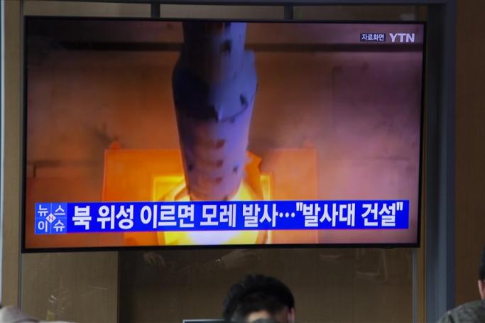 People watch the news at a station in Seoul, South Korea, 30 May 2023. Photo: EPA
