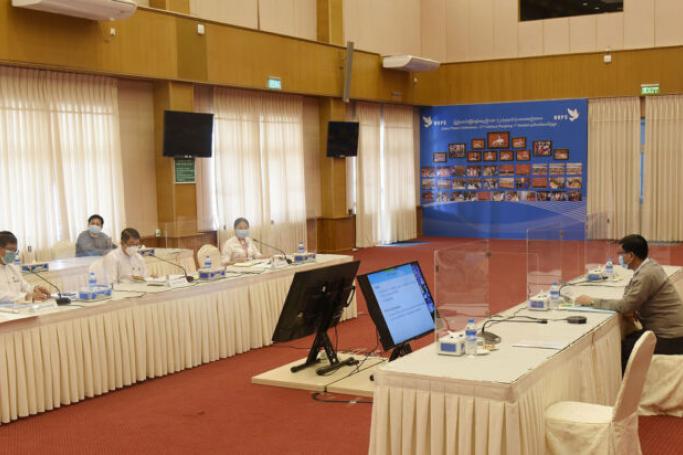 Peace Commission and two ministries hold meeting on KNU’s proposals for Bawkahta hydropower project via videoconferencing on 18 December 2020. Photo: MNA