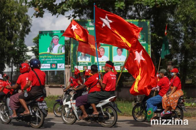 Supporters of National League for Democracy (NLD) party take part in an election campaign rally at Hlegu township in Yangon on October 25, 2020. Photo: Thura/Mizima