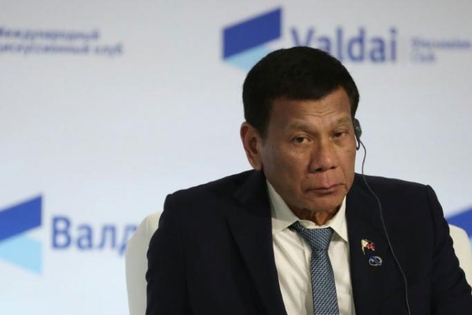 Philippine President Rodrigo Duterte revealed he was suffering from an autoimmune illness during a visit to Russia (AFP Photo/Mikhail Klimentyev)