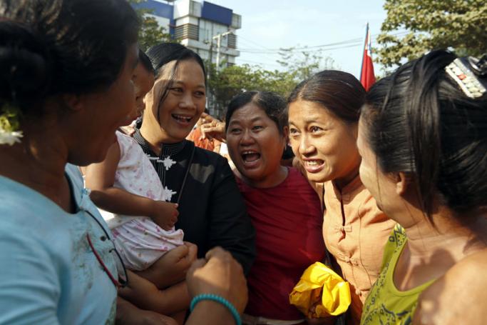 Political activist Naw Ohn Hla (C) is reunited with her friends after her release from Insein prison in Yangon, Myanmar, 17 April 2016. Photo: Nyein Chan Naing/EPA
