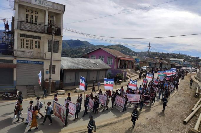 Protestors take to the streets of Tonzang township in Chin State following recent murder of a female teacher. Photo: Chin World