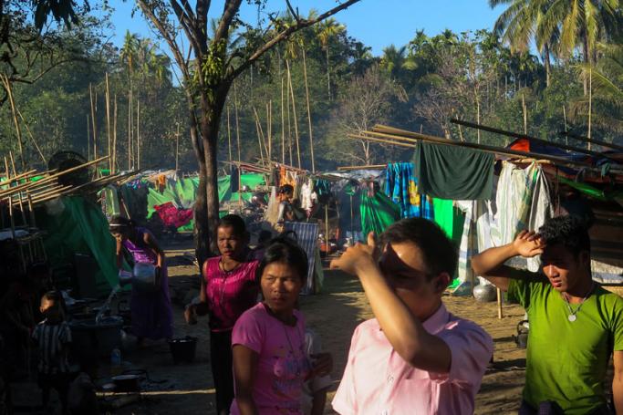 People, displaced by violence between ethnic Rakhine rebels and Myanmar's army, gather at a makeshift camp in Kyauktaw, Rakhine state. Photo: AFP