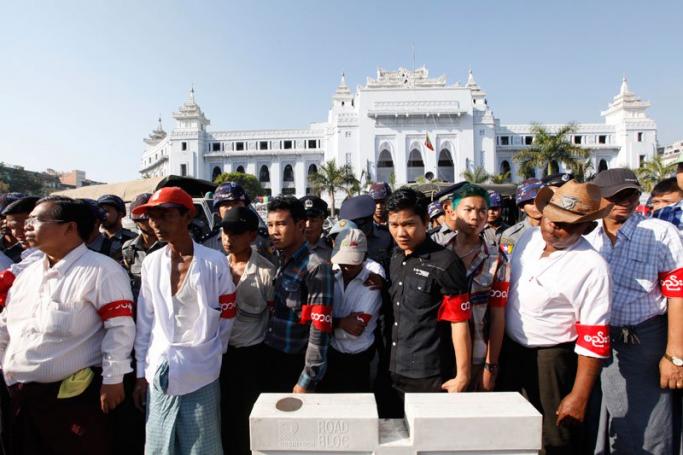 The Yangon government's hiring young men to break up a protest in Yangon has raised questions as to whether the authorities are returning to the dark days of the former military junta. Photo: Mizzima
