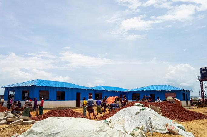Rohingya refugees work to build a quarantine centre at the Kutupalong refugee camp in Ukhia on June 4, 2020. Photo: AFP