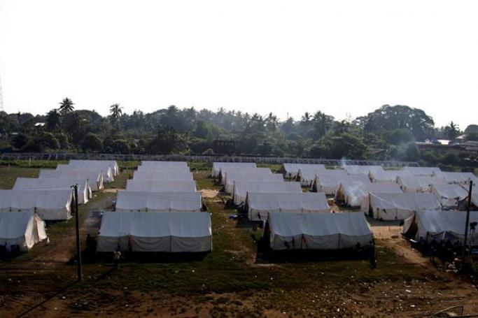 A general view shows a temporary refugee camp at the Danyawaddy football grounds, in Sittwe, Rakhine State, western Myanmar, 26 October 2016. Photo: Nyunt Win/EPA
