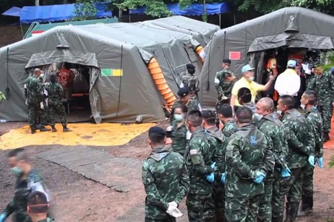 A handout photo made available by the Chiang Rai Public Relations Office on 09 July 2018 shows Thai military personnel preparing to move the boys from a youth soccer team from the cave to a hospital at Tham Luang cave in Khun Nam Nang Non Forest Park, Chiang Rai province, Thailand, 08 July 2018. Photo: EPA
