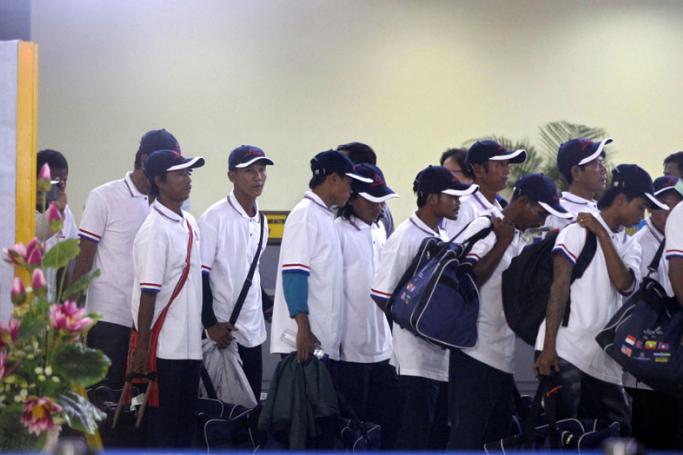 Myanmar fishing industry workers alleged to have been working under slave labor conditions arrive back to Myanmar from Indonesia, at Yangon International airport, Yangon, Myanmar, 14 May 2015. Photo: Nyein Chan Naing/EPA
