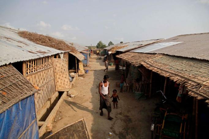 Rohingya people at the Thet Kel Pyin Muslim refugee camp in Sittwe, Rakhine State, western Myanmar, 12 May 2015. Photo: Nyunt Win/EPA
