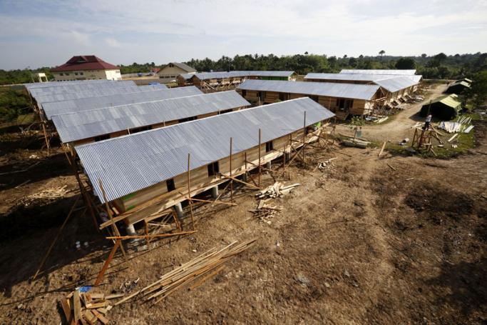 An aerial view shows temporary integrated shelter buildings for Rohingya migrants in Gampong Ado Village, Aceh, Indonesia, 19 June 2015. Photo: Hotli Simanjuntak/EPA
