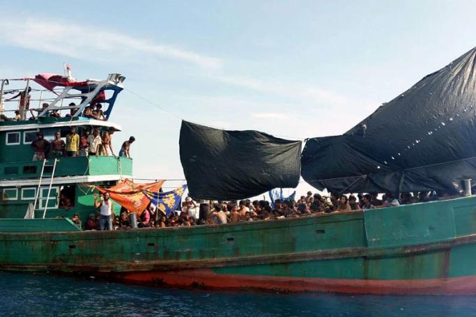Migrants, believed to have come from Myanmar and Bangladesh, on an abandoned boat drifting in the Andaman Sea close to Malaysia, southern Thailand, 14 May 2015. Photo: EPA
