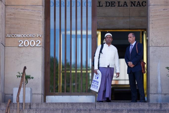 (File) Maung Tun Khin (L), President of Burmese Rohingya Organization UK (BROUK), and Argentinian Human Rights Lawyer Tomas Ojea Quintana (R) pose at the entrance to Federal Court facilities in Buenos Aires, Argentina, 16 December 2021. Photo: EPA