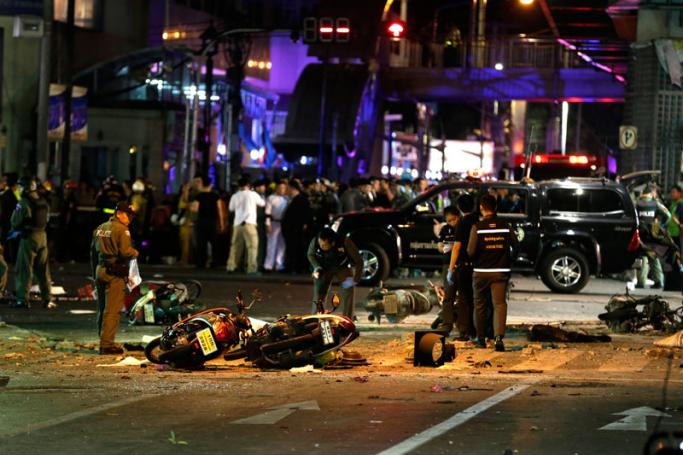 Motorcycles lie on the street at the scene of a bomb attack near Erawan Shrine, central Bangkok, Thailand, 17 August 2015. Photo: Ritchie B Tongo/EPA

