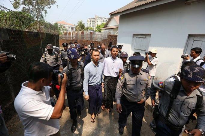 Christian Solidarity Worldwide has expressed concern over the latest religious defamation cases. Sentenced to two years hard labour for insulting religion. U Tun Thurein and U Htut Ko Ko Lwin (C), followed by Mr Philip Blackwood, at Bahan Township court on March 17, 2015. Photo: Thet Ko/Mizzima
