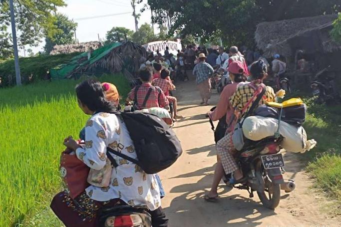 The local residents of Khin Oo Township who are fleeing as the column is coming.