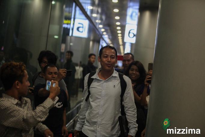 One of six leaders of the Arakan Association who arrested in Singapore arrives back at Yangon International Airport in Yangon on July 10, 2019. Photo: Thura/Mizzima