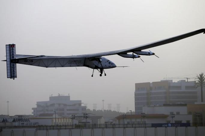 The Solar Impulse 2 plane takes off for a trip around the world from Al Bateen Executive Airport in Abu Dhabi, UAE, March 9, 2015. The trip will take the Solar Impulse 2 to Oman, India, Myanmar and China. The plane will then cross the Pacific to Hawaii and on to the US mainland. Following a flight across the Atlanic and over the Mediterranean region, the pilots are planning to return to the capital of the United Arab Emirates. Photo: Ali Haider/EPA 
