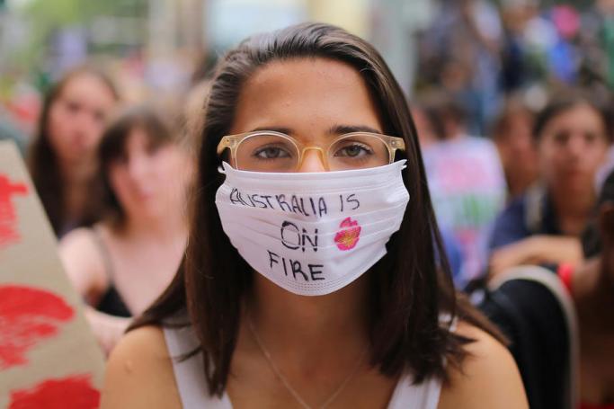 A student activist poses for a portrait during a 'Solidarity Sit-down' protest outside of the office of the Liberal Party of Australia in Sydney, Australia, 29 November 2019. Photo: Steven Saphore/EPA-EFE