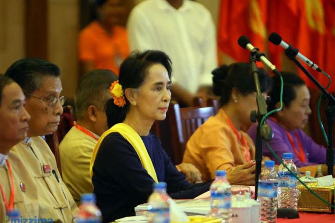 Chairperson of the National League for Democracy party Aung San Suu Kyi attends a party meeting at Royal Rose hall in Yangon on 28 November 2015. Photo: Thet Ko/Mizzima
