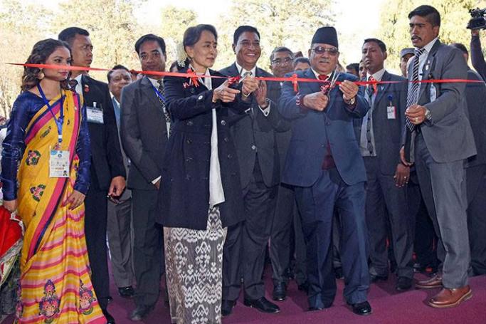 Myanmar State Counsellor Aung San Suu Kyi cuts a ribbon on her visit to Nepal. Photo: MOI