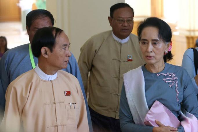 Speculation surrounds whether there might be a way for Suu Kyi to be fast-tracked into the post of president in Myanmar once her party takes power. Suu Kyi, right, is seen here with NLD members. Photo: Hong Sar/Mizzima
