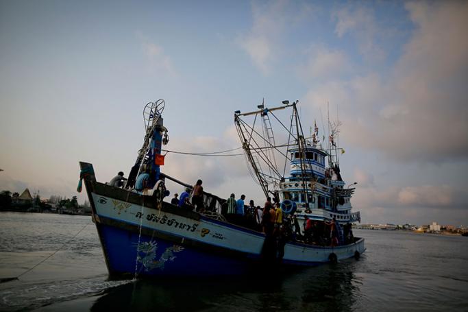 Migrant fishermen from Myanmar on a Thai fishing boat arriving at a jetty in Samut Sakhon province, Thailand, 11 March 2016. Photo: Diego Azubel/EPA
