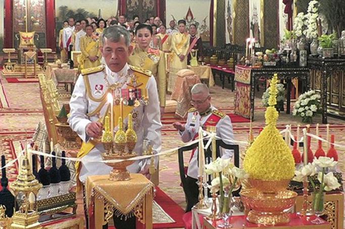 A handout photo made available by the Committee on Public Relations for the Coronation of King Rama X, shows Thai King Maha Vajiralongkorn Bodindradebayavarangkun (C) during the religious ceremony for the coronation inside the Royal palace in Bangkok, Thailand, 03 May 2019. Photo: EPA