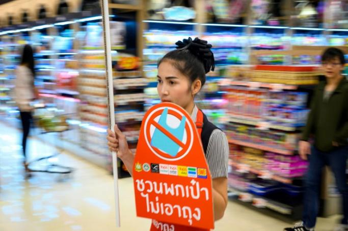 The move by major retailers in Thailand will see customers instead paying a small fee for a reusable bag made of a cloth-like fabric (AFP / Mladen ANTONOV)