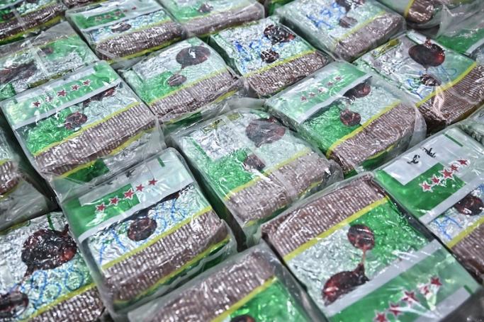 Packages of crystal methamphetamine are seen displayed on a table before a press conference at the Narcotics Suppression Bureau in Bangkok on January 24, 2023. Photo: AFP
