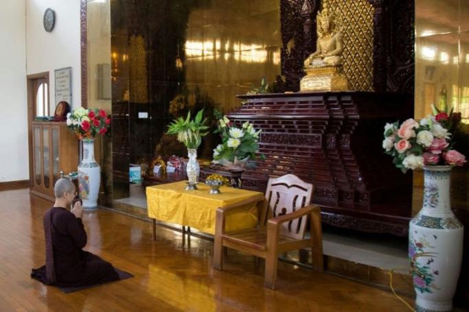 This photo taken on August 26, 2020 shows Myanmar Buddhist nun Ketumala praying at a monastery in Yangon. Photo: Sai Aung Main/AFP