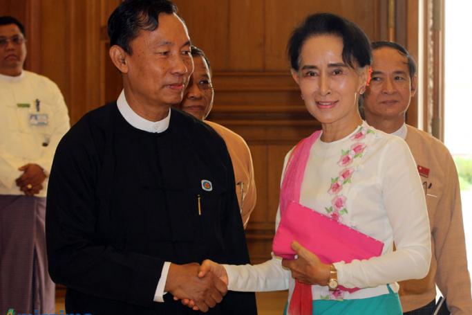Parliament speaker Thura Shwe Mann (L) shakes hands with Myanmar opposition leader Aung San Suu Kyi (R) during their meeting at the parliament in Nay Pyi Taw on 19 November 2015. Photo: Thet Ko/Mizzima
