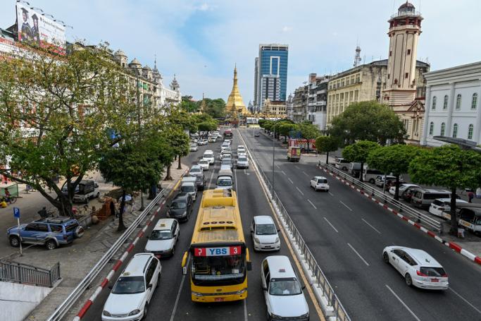 Motorists travel along a road in Yangon on May 14, 2020. Photo: Ye Aung Thu/AFP