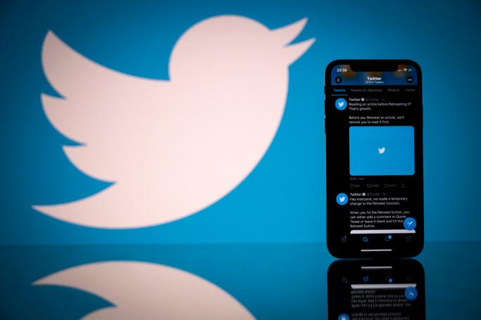 The logo of US social network Twitter displayed on the screen of a smartphone and a tablet. Photo: AFP