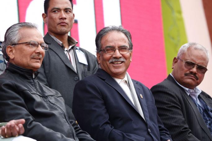 Unified Communist Party of Nepal (Maoist) Chairman Pushpa Kamal Dahal, also known as 'Prachanda' (C), and Deputy Chairman Baburam Bhattrai (L) along with President of the Madheshi Janadhikar Forum Bijaya Gachedar (R) during an anti-government mass meeting in Kathmandu, Nepal, 28 February 2015. Photo: Narendra Shrestha/EPA
