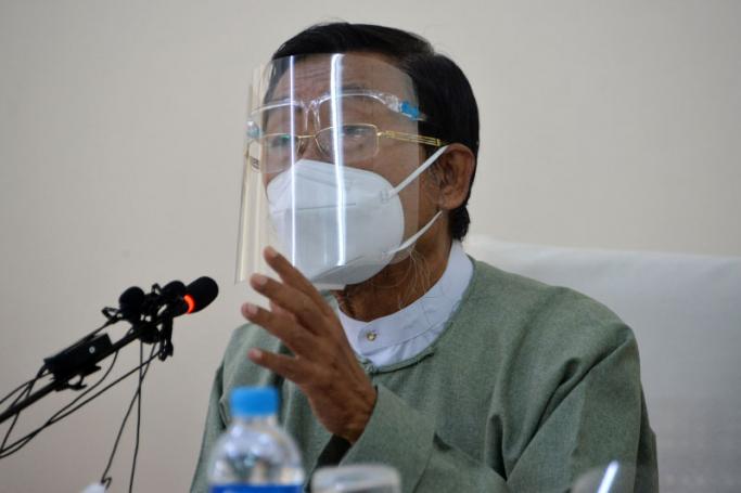 Myint Naing, a member and spokeperson of Myanmar Union Election Commission, speaks during a press conference in Naypyidaw on November 11, 2020. Photo: AFP