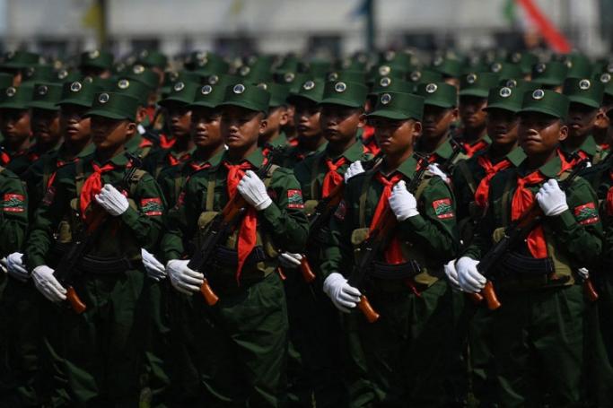 United Wa State Army (UWSA) soldiers participate in a military parade, to commemorate 30 years of a ceasefire signed with the Myanmar military in the Wa State on April 17, 2019. Photo: AFP