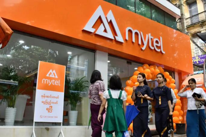 A Mytel showroom in central Yangon draws visitors. Photo Yuichi Nitta