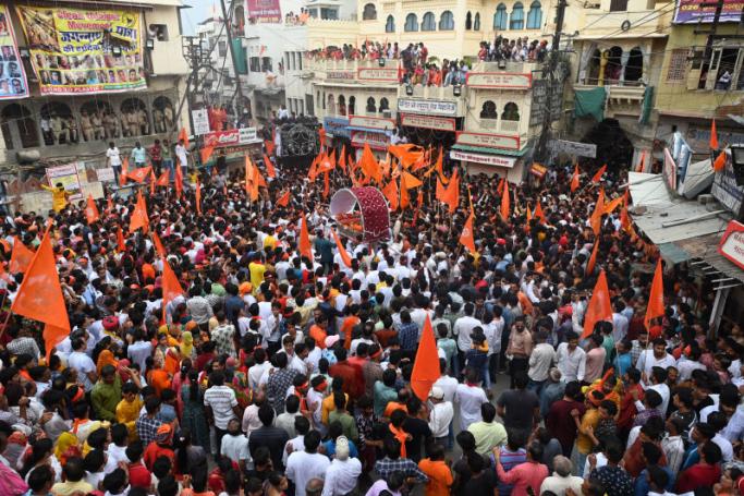  Hindu devotees take part in Jagannath Rath Yatra religious procession outside the Jagdish Temple in Udaipur on July 1, 2022. Photo:  Sajjad HUSSAIN / AFP