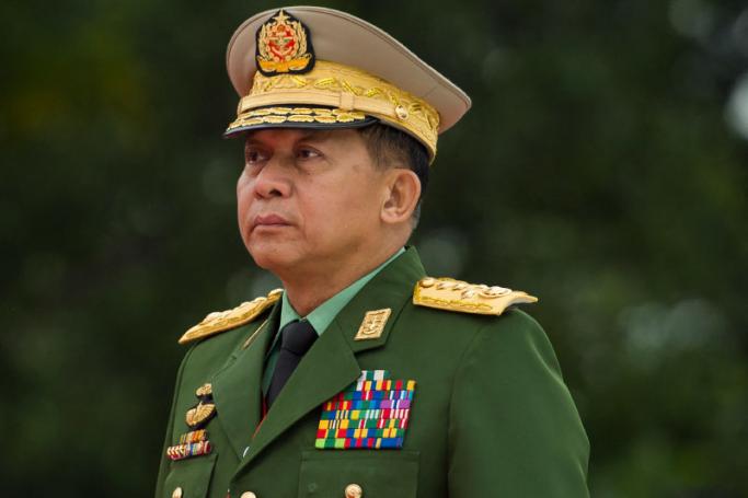 Myanmar's Chief Senior General Min Aung Hlaing, commander-in-chief of the Myanmar armed forces, arrives to pay his respects to Myanmar independence hero General Aung San and eight others assassinated in 1947, during a ceremony to mark the 71th anniversary of Martyrs' Day in Yangon on July 19, 2018.  Photo: AFP
