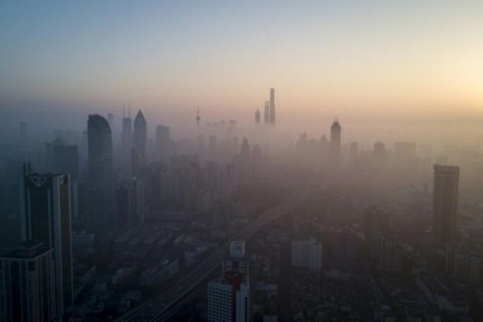 Cities like Shanghai are frequently shrouded in smog from China's pollution-belching factories (Photo: AFP)