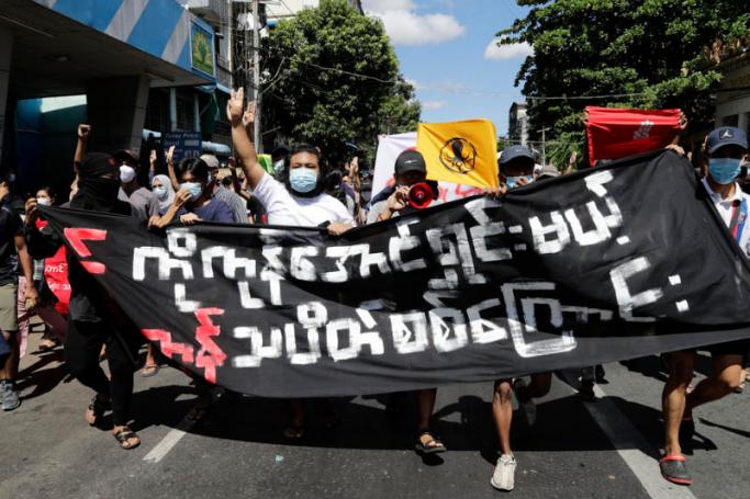 Citizens march during an anti-military coup protest in Yangon. Photo: EPA  