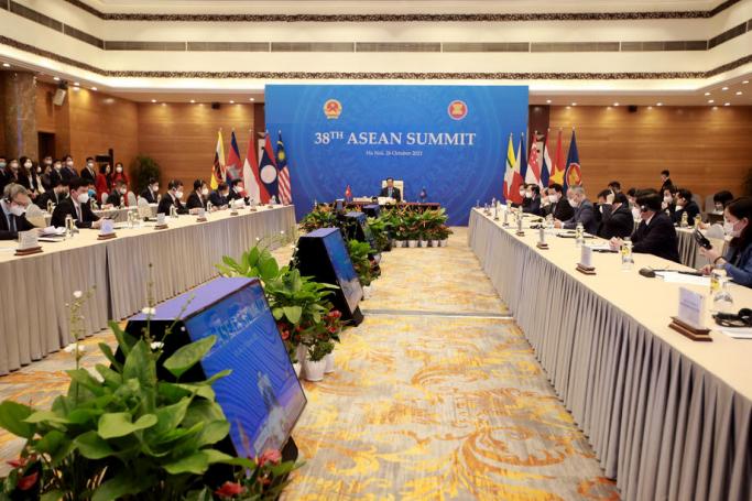 Vietnam's Prime Minister Pham Minh Chinh (C) attends the 38th Association of Southeast Asian Nations (ASEAN) meeting, which is hosted via video conferencing from Brunei amid the COVID-19 pandemic, in Hanoi, Vietnam, 26 October 2021. Photo: EPA