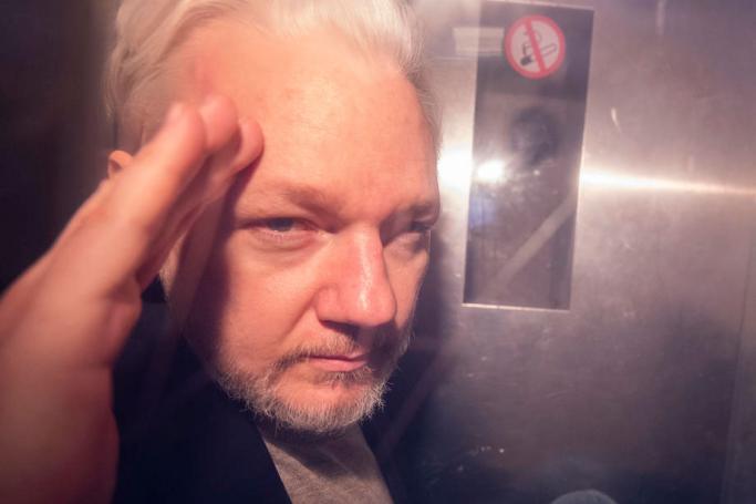 (FILE) - Wikileaks co-founder Julian Assange, in a prison van, as he leaves Southwark Crown Court in London, Britain, 01 May 2019, reissued 13 May 2019. Photo: EPA