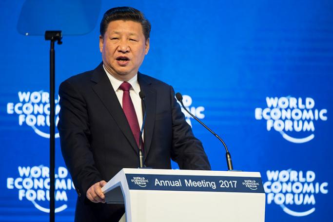 China's President Xi Jinping (L) delivers a speech in the Congress Hall on day one of the 47th Annual Meeting of the World Economic Forum (WEF) in Davos, Switzerland, 17 January 2017. Photo: Laurent Gilieron/EPA
